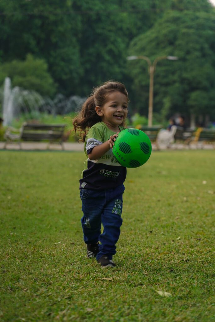 Childrens Photography 2025 8 Children Photography(Childhood Photography) playing with ball in garden