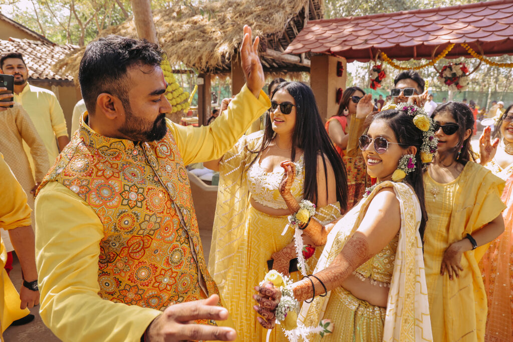 Haldi 2 Haldi (Pithi Ceremony) Bride and Groom Dance together in haldi ceremony in yellow dress